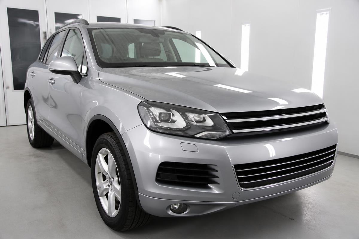 Silver family SUV after accident repair and refinishing at our workshop