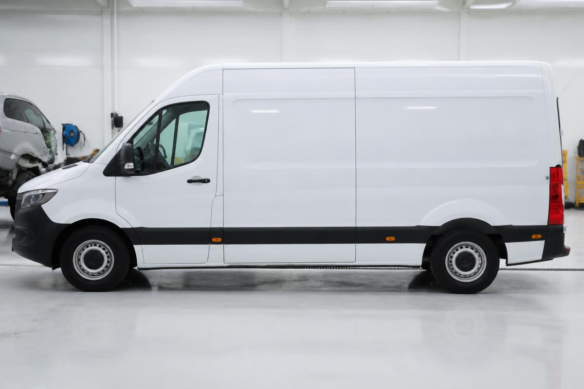 White long wheelbase panel van after accident repair and refinishing at our workshop
