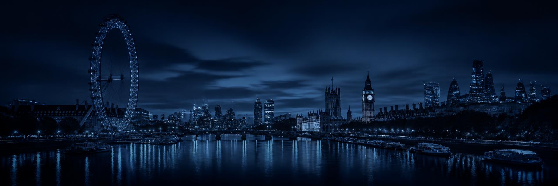 London skyline at dusk along the River Thames